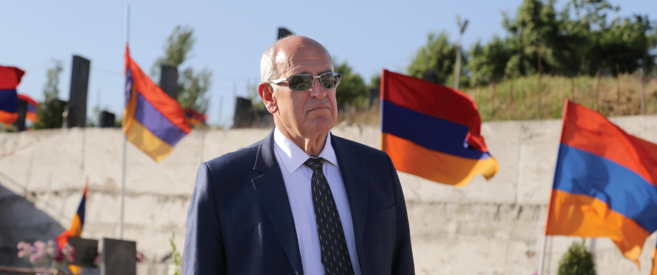 AGBU President Berge Setrakian at the Yerablur Military Pantheon, paying his respects to the fallen soldiers of the 2020 Artsakh War.