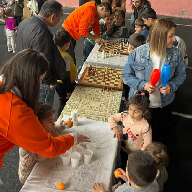 Volunteers playing with children from Hrazdan
